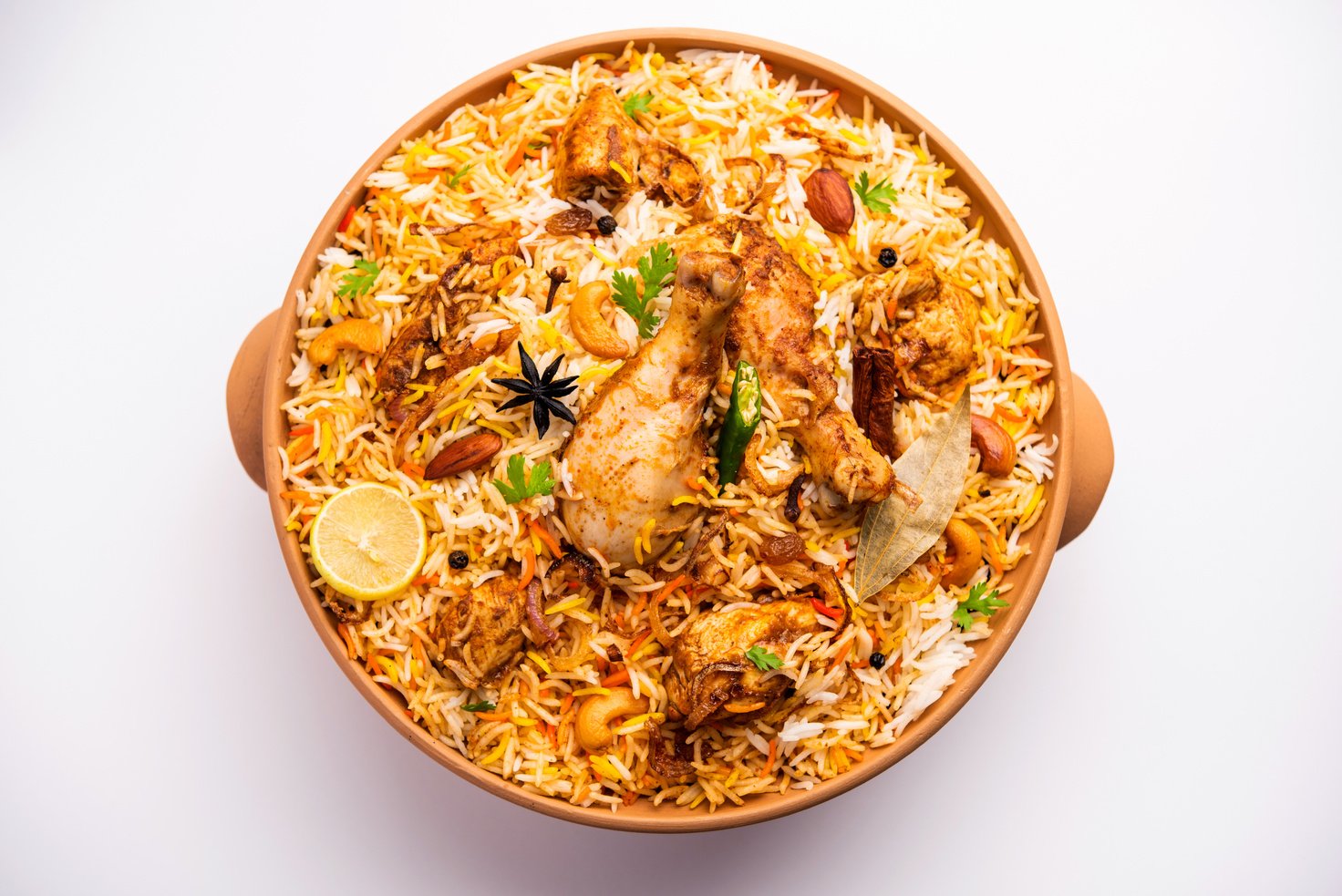 Pan of Chicken Biryani on Plain Background 