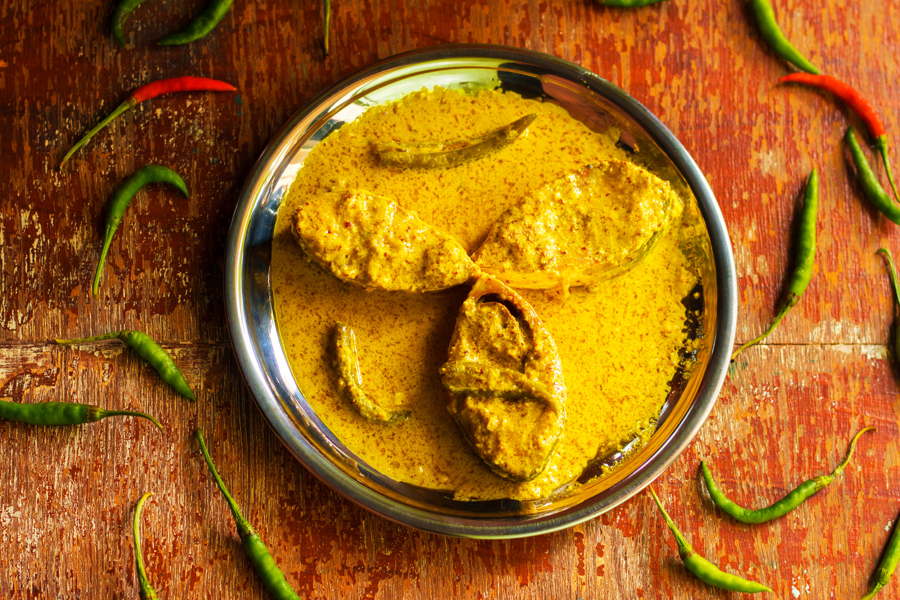 Ilish or Hilsa famous bengali fish curry with grinded mustard seed